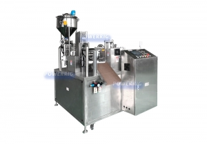 Rotary spoon filling machine